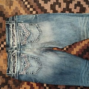 Miss Me "easy boot" wing design on distressed yoke